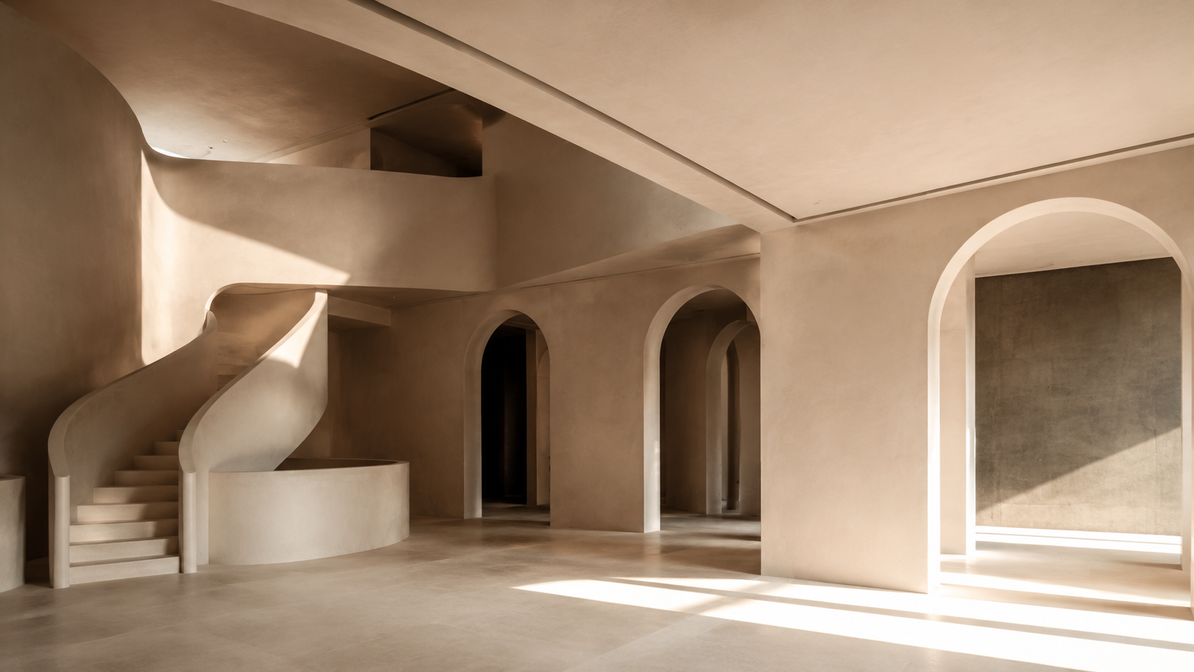 Conceptual custom-home interior with curved drywall and tall architectural openings